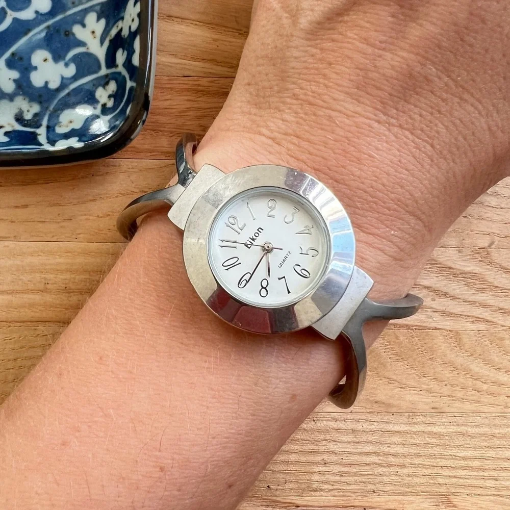 Eikon ladies silver tone bangle cuff watch NEW BATTERY